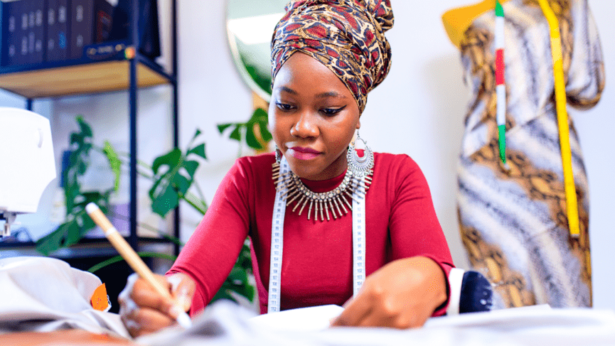 eKash business owner serving a customer
